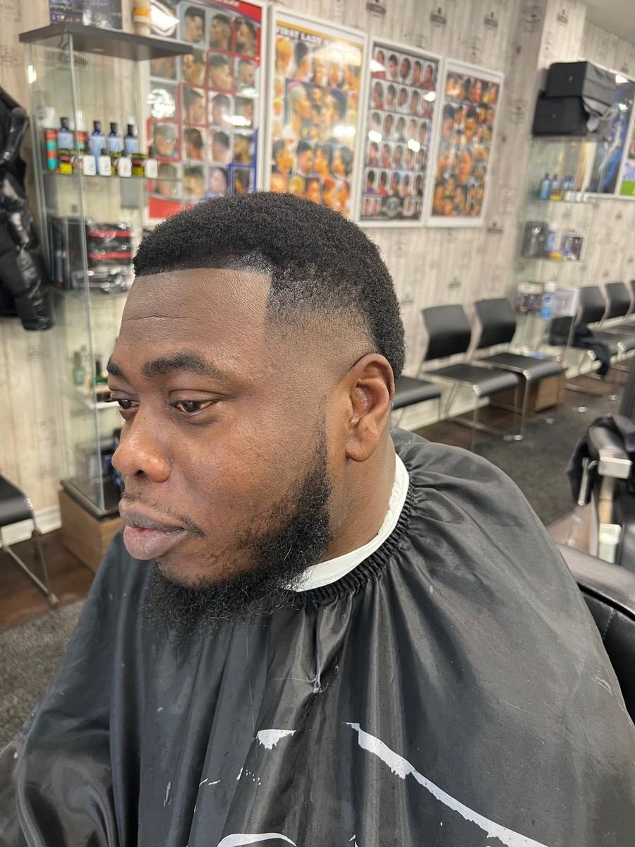 Fade with beard shape-up at salondecoiffuredezack